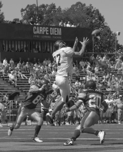 Woody Butler grabs a pass up high for McDaniel's first touchdown of the day against St. Vincent
