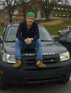 Junior Jeremy Allen poses with his 2003 Freelander Land Rover.